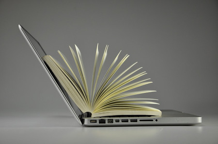 Laptop with book
